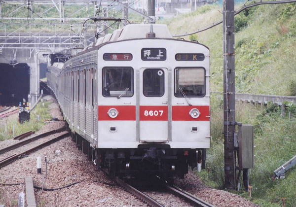 8607